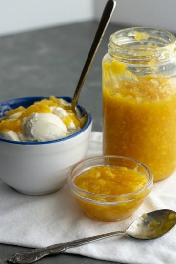 Fresh Homemade Pineapple Sauce in a jar with ice cream