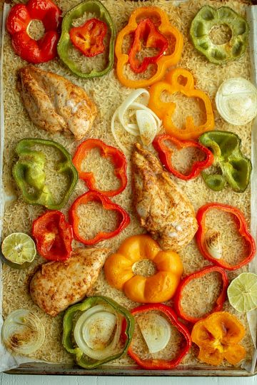 Bake zesty chicken Fajitas and cook savory rice all in one pan!