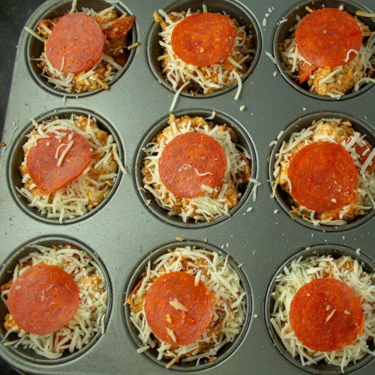pizza poppers ready for oven in muffin tray