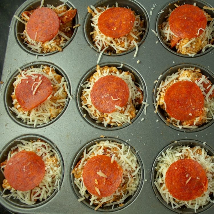 pizza poppers ready for oven in muffin tray