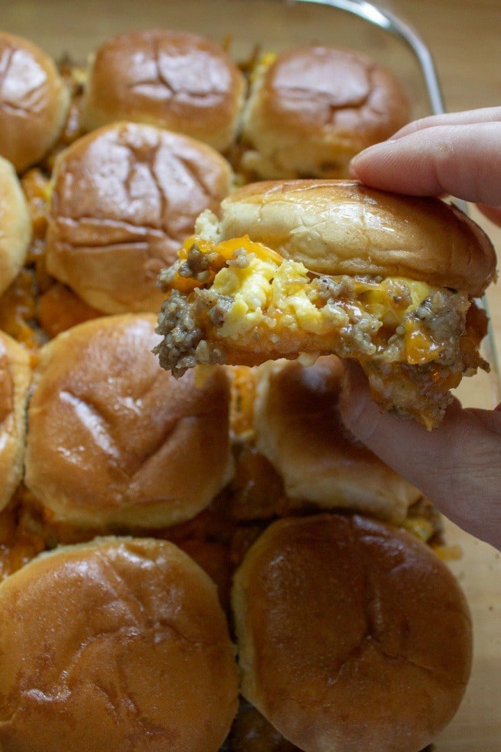 egg sausage breakfast slider in hand