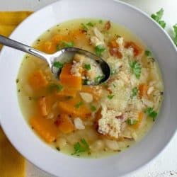 Savory Butternut Squash Bean Soup is a savory protein-packed blend of butternut squash, white beans, chickpeas and couscous. Warm, comforting and so tasty this will be a favorite family soup.