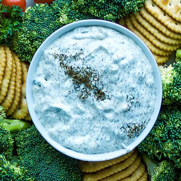 Simple and refreshing, this creamy dill dip is party ready in just minutes. Dill dip is perfect served with your favorite chips, crackers and fresh chopped veggies! #mustlovehomecooking