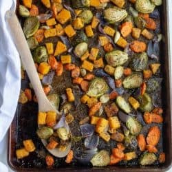 roasted vegetables on a pan with parmesan olive oil and garlic