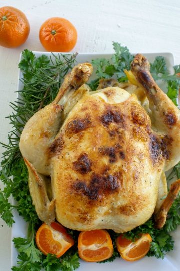 Slow Cooker Whole Chicken recipe is a deliciously seasoned Sunday dinner style chicken made in the crock pot.