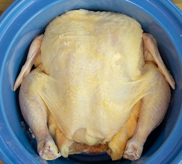 This slow cooker whole chicken is a deliciously seasoned Sunday dinner style chicken made with the help of a crock pot.