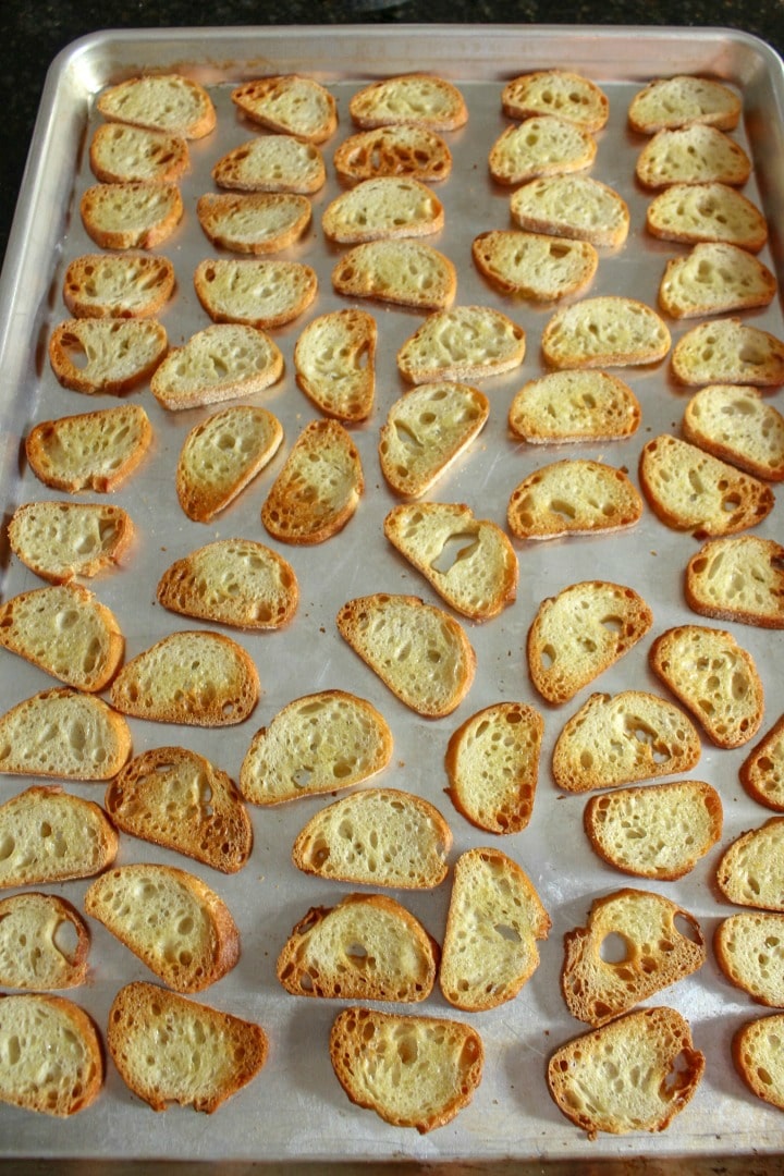 Crostini on a sheet pan for appetizers