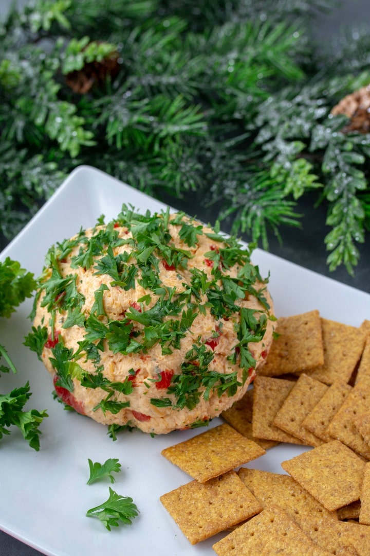 Try this festive Roasted Red Pepper Ranch Cheese Ball for your next gathering. Easy to make with only a handful of ingredients!