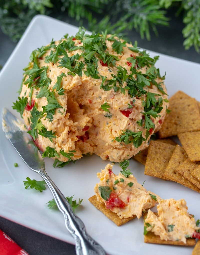 Try this festive Roasted Red Pepper Ranch Cheese Ball for your next gathering. Easy to make with only a handful of ingredients!