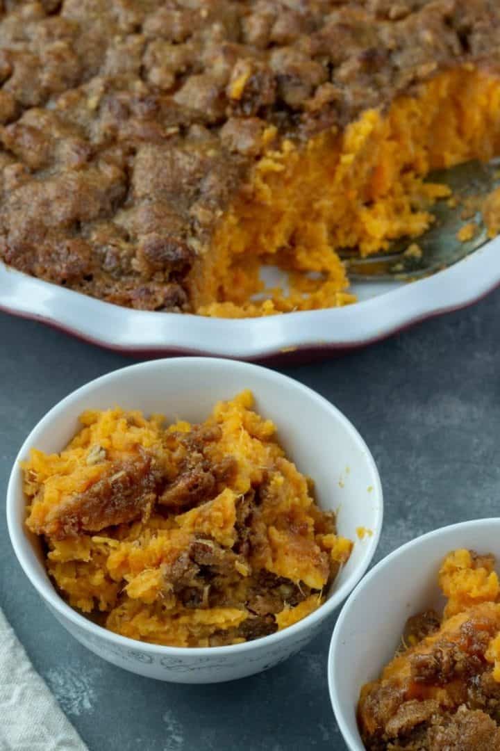 Whipped Sweet Potato Pecan Casserole - A crunch topped seasonal favorite, made deliciously light by sweetening with bananas. Make ahead and freezer friendly too!