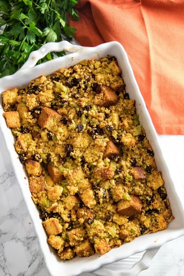 Southern Cornbread Stuffing (aka Dressing) made with vegetables, spices and plump raisins is from a favorite West Virginia family recipe.