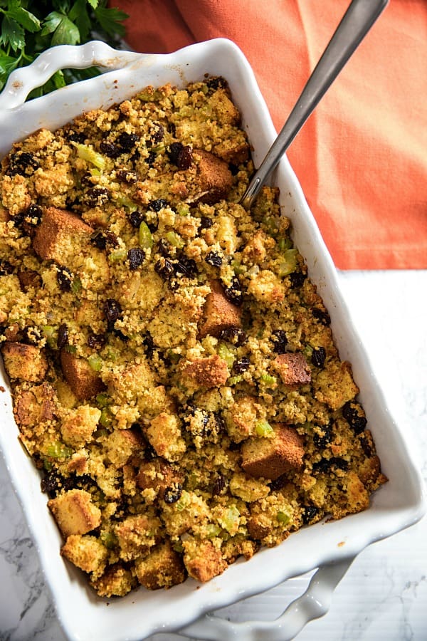 Southern Cornbread Stuffing (aka Dressing) made with vegetables, spices and plump raisins is from a favorite West Virginia family recipe.