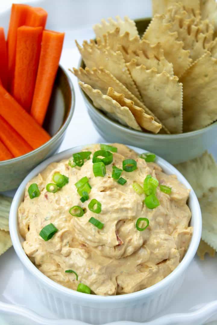 Irresistible Sun Dried Tomato Dip - Crazy delicious and super easy, try this and you'll never need another party dip recipe! Takes less than 5 minutes to make!