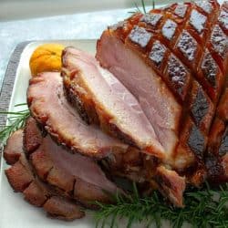 So easy and delicious, perfectly caramelized Brown Sugar Rum Baked Ham will be the centerpiece of your Sunday or holiday dinner table. Great for parties and potlucks too!