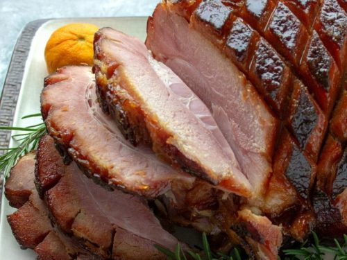 So easy and delicious, perfectly caramelized Brown Sugar Rum Baked Ham will be the centerpiece of your Sunday or holiday dinner table. Great for parties and potlucks too!