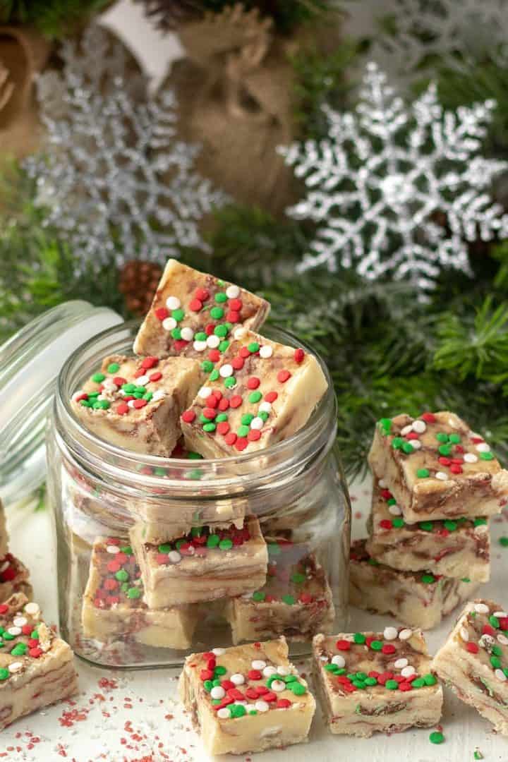 A sweet Holiday Cake Mix Fudge made with white cake mix and marbled with chocolate candies!