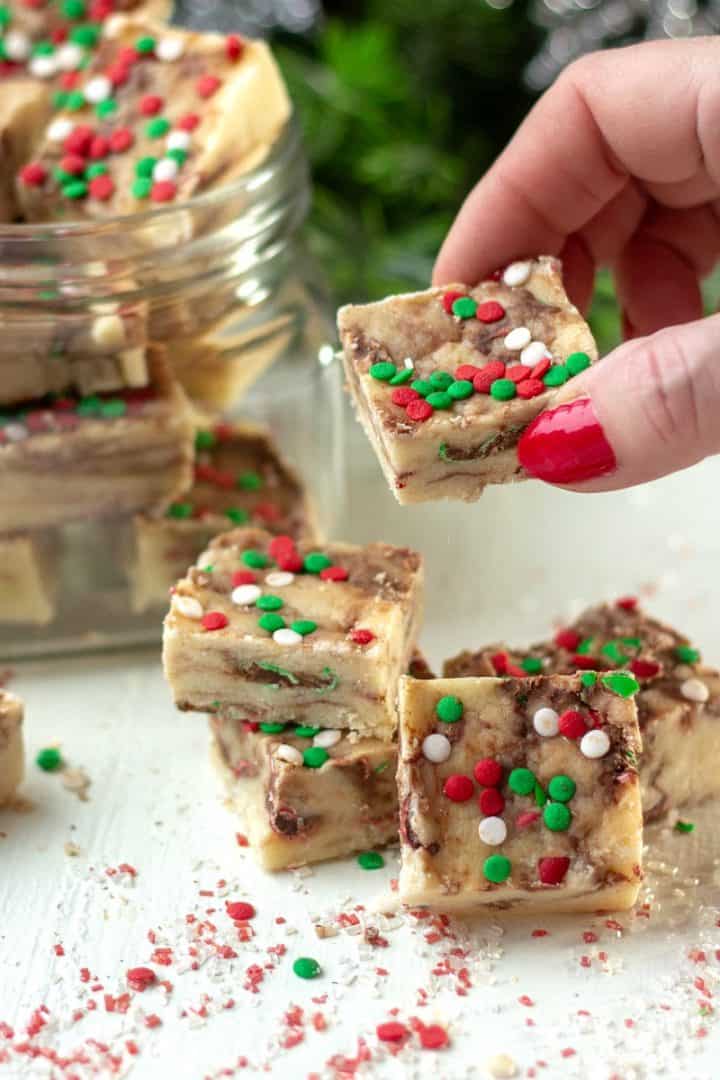 A sweet Holiday Cake Mix Fudge made with white cake mix and marbled with chocolate candies! A great cookie alternative!