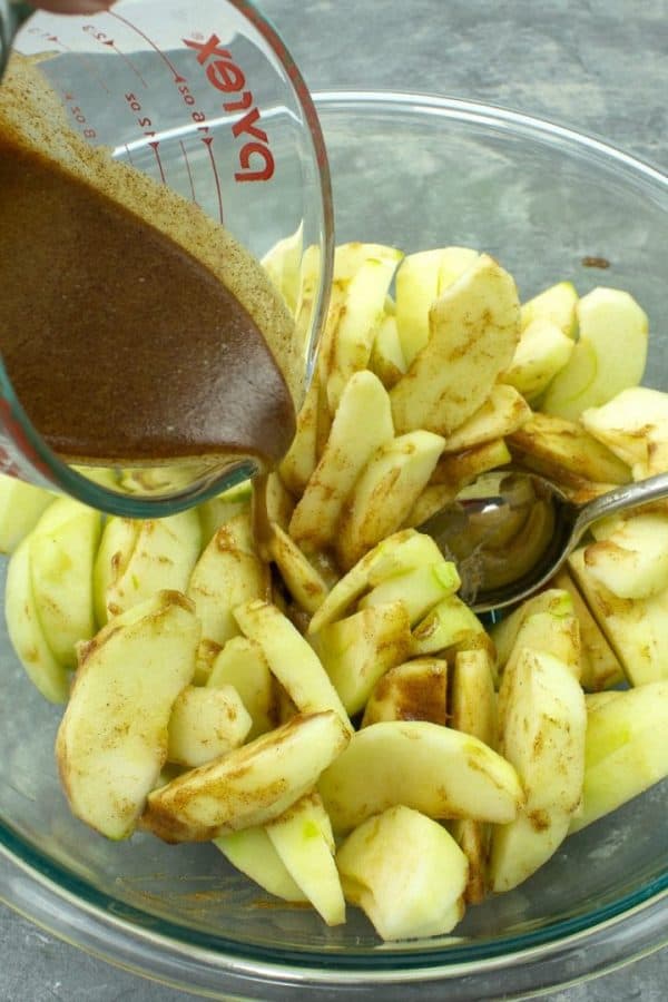 Thinly sliced apples coated with brown sugar syrup