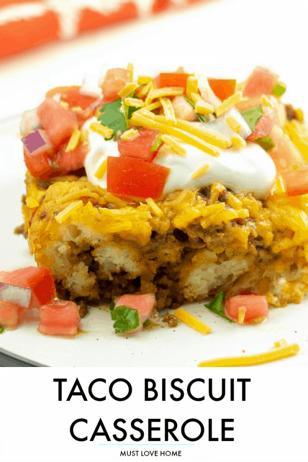 Soft and chewy, filled with spicy ground beef and oozing with cheese, this Taco Biscuit Casserole is an amazing addition to the taco night lineup!