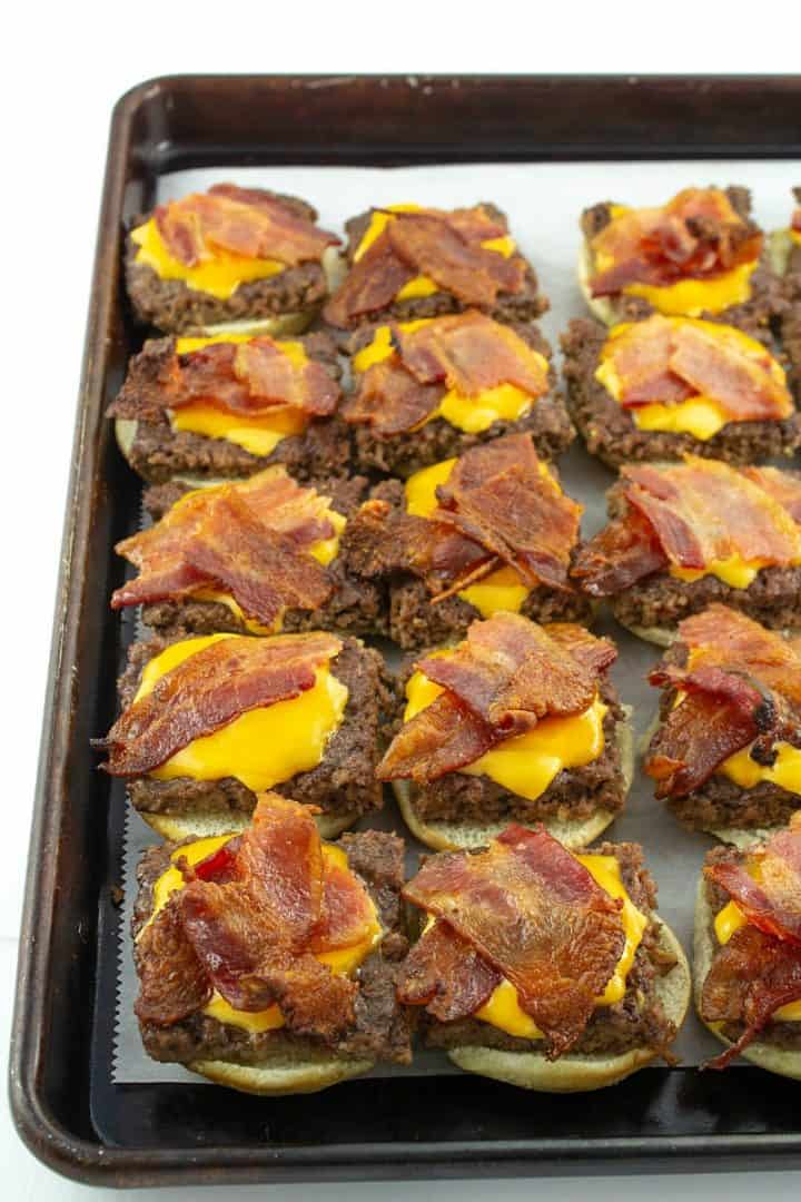 Tender beef, crispy bacon and oozing with melting cheese, you won't believe how simple these Bacon Cheeseburger Sliders are to make. Everything is made in the oven in under 30 minutes!