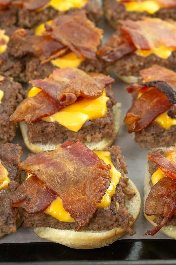 Tender beef, crispy bacon and oozing with melting cheese, you won't believe how simple these Bacon Cheeseburger Sliders are to make. Everything is made in the oven in under 30 minutes!