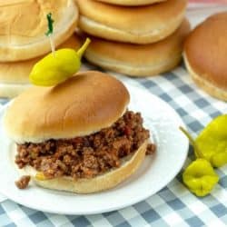 Slow Cooker Sloppy Joes, made with ground beef soaked in a savory sauce of tomatoes, ketchup, barbecue sauce and spices. Makes enough to feed a crowd or to freeze for later!