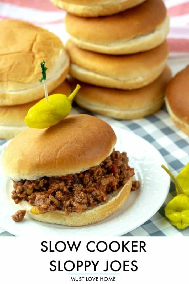 Slow Cooker Sloppy Joes, made with ground beef soaked in a savory sauce of  tomatoes, ketchup, barbecue sauce and spices. Makes enough to feed a crowd or to freeze for later!