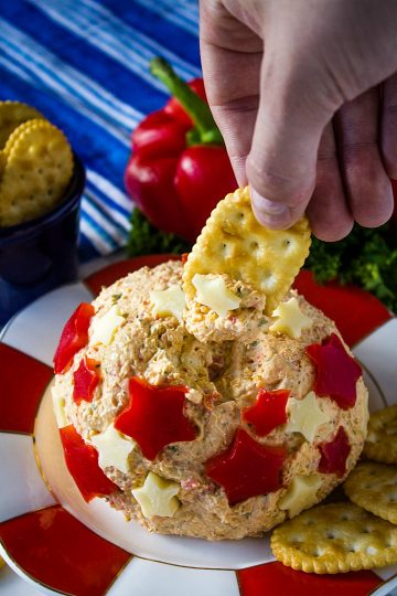 A creamy, ranch and sweet red pepper flavored cheese ball decorated for all your summer celebrations! Makes enough for a crowd!
