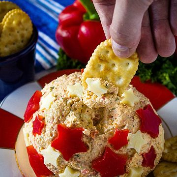 Easy Patriotic Ranch Cheese Ball is a quick appetizer decorated for your summer celebrations! Makes enough for a crowd! #mustlovehomecooking