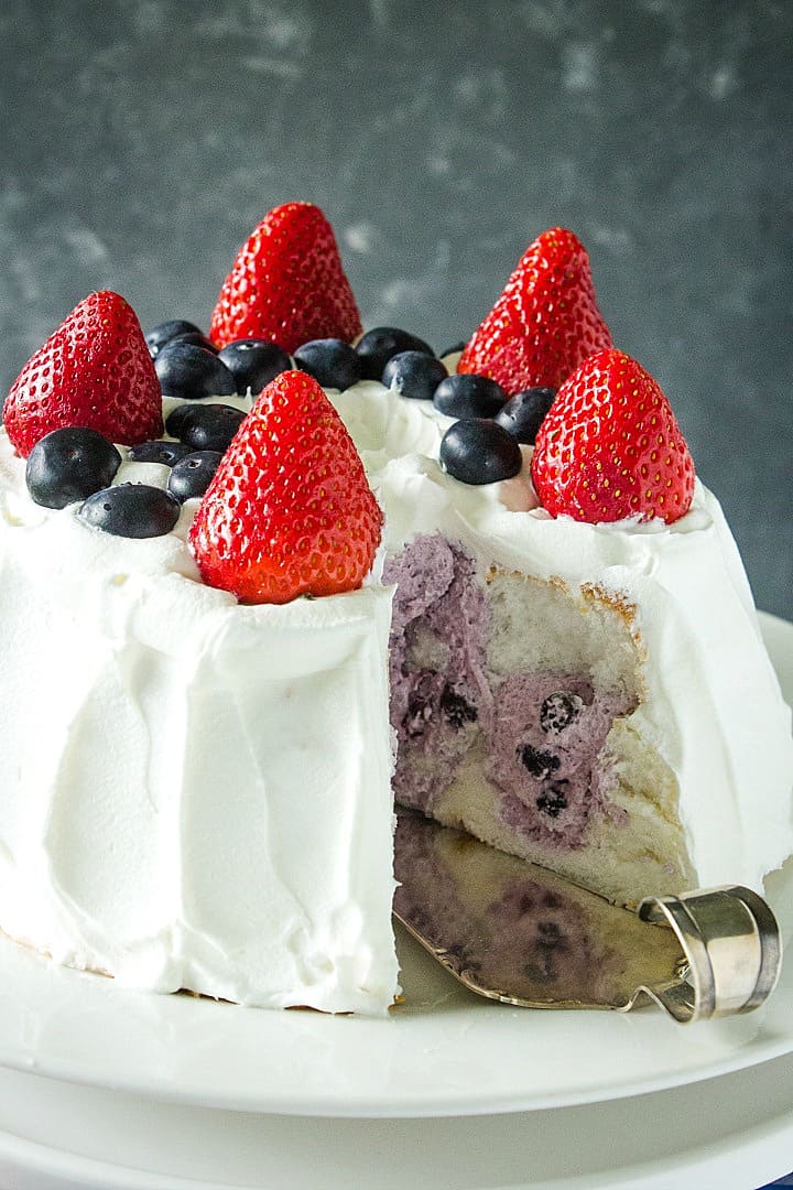Whipped topping, blueberry pie filling and a store-bought angel food cake make this a quick and easy summer dessert. Great for Red, White and Blue celebrations! #mustlovehomecooking