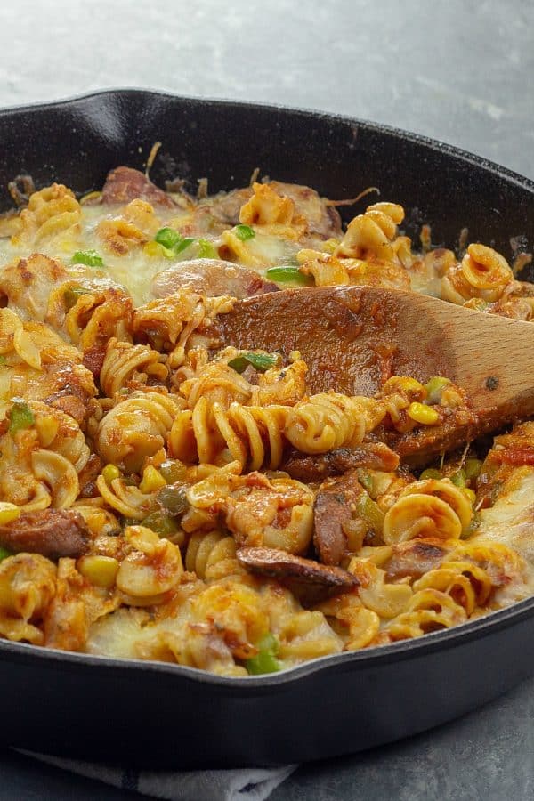 Smoked Sausage Italian Pasta Skillet, with corn, green bell peppers and tasty red sauce that's an easy, 30 minute family dinner.