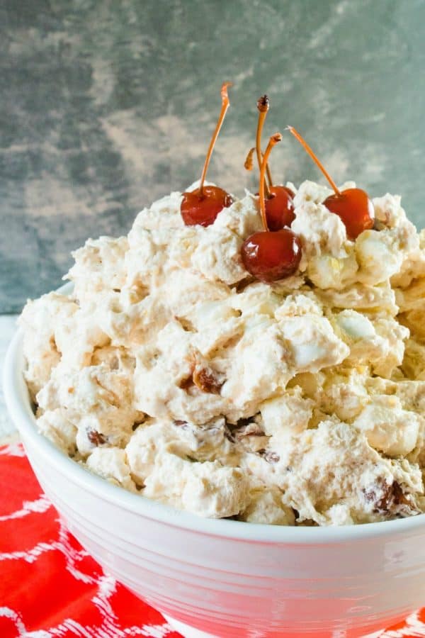 cherry pineapple fluff in white serving bowl