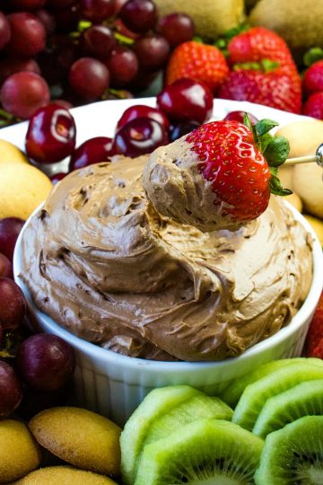 Chocolate Lovers Fruit Dip is a cool and creamy treat made with melted chocolate, cocoa, cream cheese and luscious whipped cream. This delicious chocolate dip is great for parties, dessert or after school snacks! #mustlovehomecooking