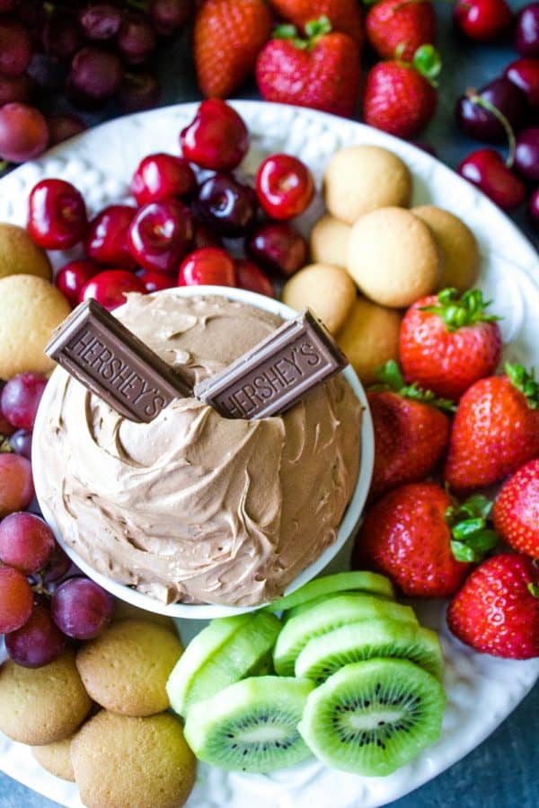 Chocolate Lovers  Fruit Dip is a cool and creamy treat made with melted chocolate, cocoa, cream cheese and luscious whipped cream. This delicious chocolate dip is great for parties, dessert or after school snacks! #mustlovehomecooking
