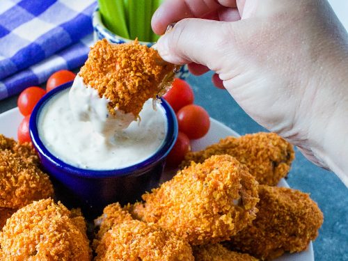 Chicken wings, coated with spicy tortilla chips and oven-baked to crispy perfection - these wings are a winner!