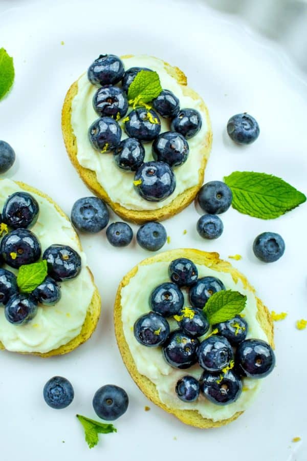 Blueberry Honey Whipped Ricotta Crostini -Blueberries, ricotta cheese and honey are paired to make this elegant perfect party appetizer!