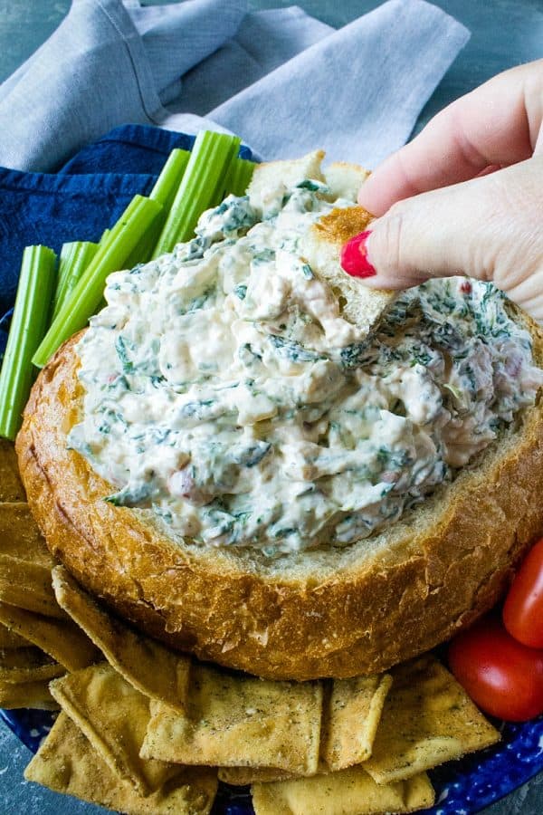 Learn to make Easy Spinach Dip Recipe with spinach, bell pepper, water chestnuts and a seasoned sauce that tastes amazing!