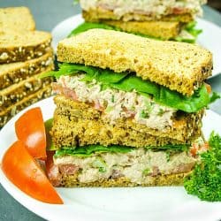 Loaded with tuna, crunchy sweet red pepper, green onions, celery, relish and seasonings, this tasty Classic Tuna Salad Recipe is great for a light meal or anytime snack! #mustlovehomecooking