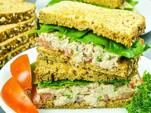 Loaded with tuna, crunchy sweet red pepper, green onions, celery, relish and seasonings, this tasty Classic Tuna Salad Recipe is great for a light meal or anytime snack! #mustlovehomecooking
