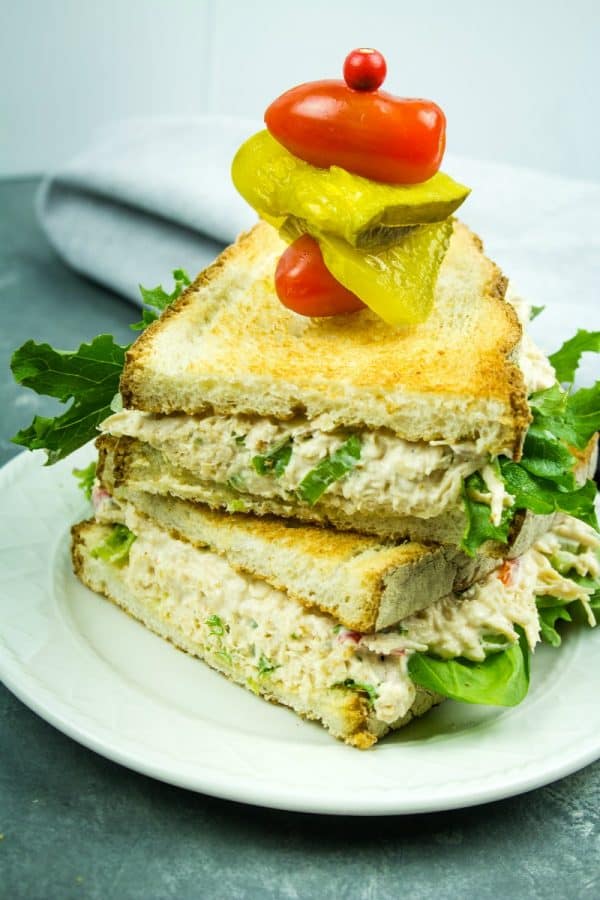 Best Ever Chicken Salad - Shredded chicken, red bell pepper, green onions, celery, nuts and seasonings make this classic salad a tasty anytime sandwich topping!