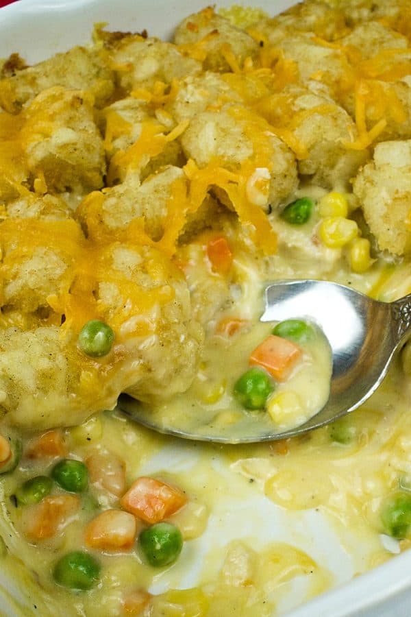 Full of chicken, vegetables and a creamy sauce that makes an irresistible family size Chicken Tater Tot Casserole freezer meal!