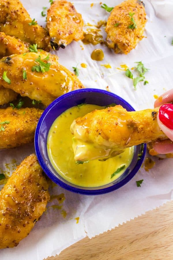 Tangy and sweet, these crispy honey mustard chicken wings coated with a zesty mustard sauce are always a hit for parties, gamedays or an easy meal!