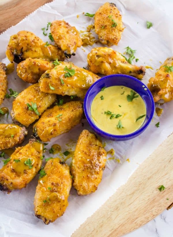 Tangy and sweet, these crispy honey mustard chicken wings coated with a zesty mustard sauce are always a hit for parties, gamedays or an easy meal!