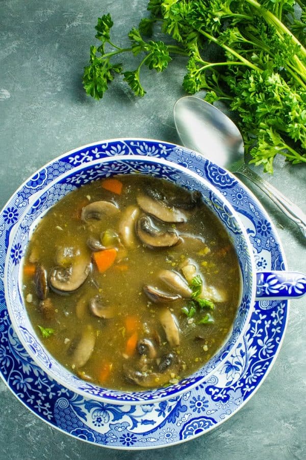 An earthy, full of flavor, healthy mushroom soup, made with mushrooms, vegetables, seasonings and broth is just right for a cozy meal.