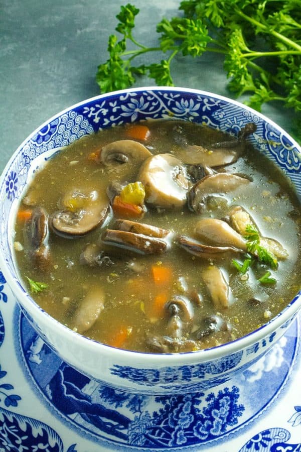 An earthy, full of flavor, healthy mushroom soup, made with mushrooms, vegetables, seasonings and broth is just right for a cozy meal.