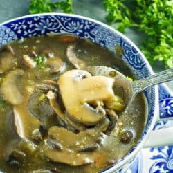 An earthy, full of flavor, healthy mushroom soup, made with mushrooms, vegetables, seasonings and broth is just right for a cozy meal.