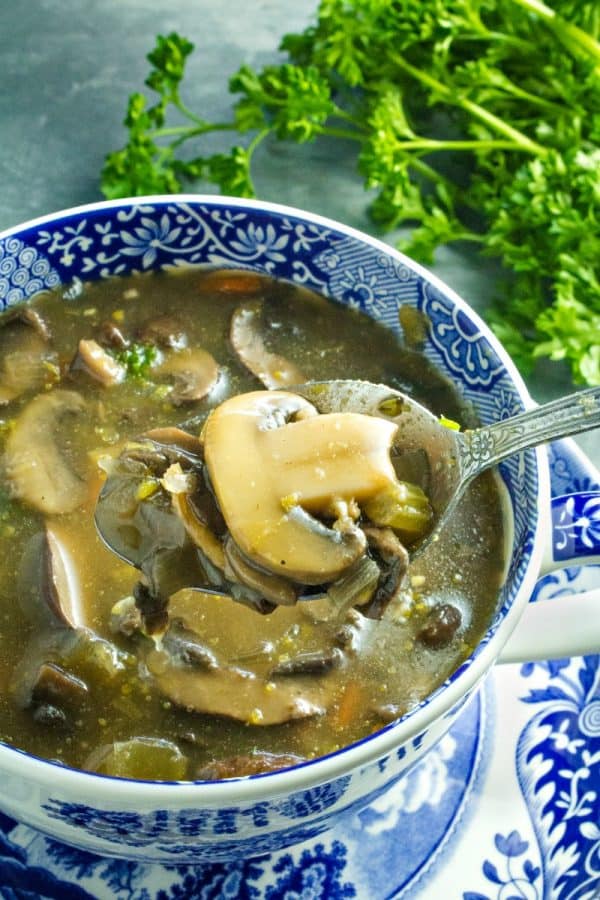 An earthy, full of flavor, healthy mushroom soup, made with mushrooms, vegetables, seasonings and broth is just right for a cozy meal.
