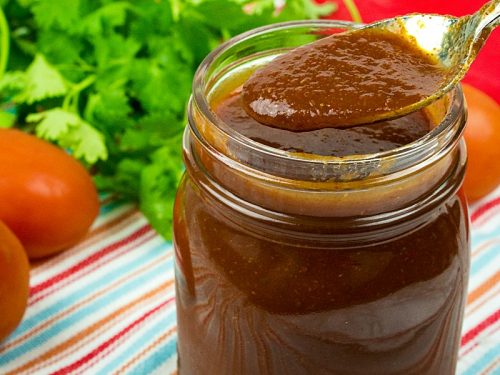 Easy Red Enchilada Sauce, a mixture of tomato sauce, vegetable broth plus Mexican spices creates a thick Red Enchilada Sauce for enchiladas, tamales, Mexican lasagna and more! Great to freeze for later!