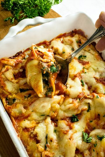 Healthy cheese and veggie stuffed shells made ahead for an easy family freezer meal.