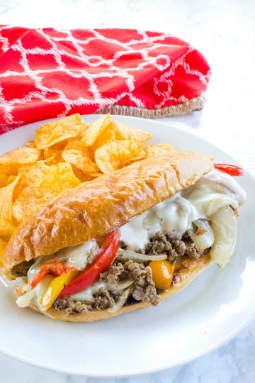 This easy freezer meal Philly cheese steak is the BEST! With tender shaved steak, peppers, onions and spices it's everything you could want in a freezer meal - delicious, pan ready and served in minutes.
